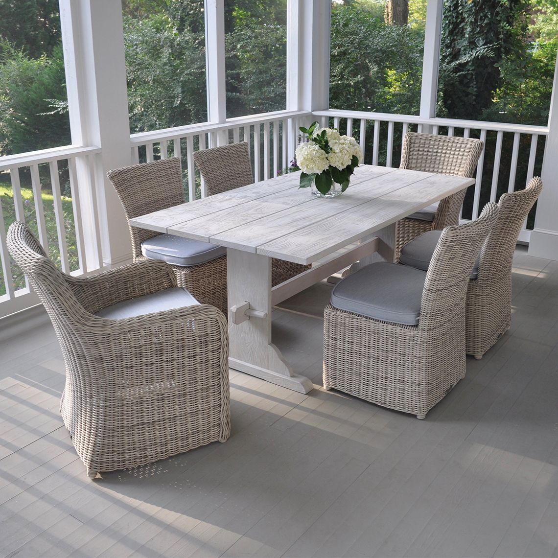 A substantial 92-inch outdoor dining table combining Scandinavian farm table aesthetics with Grade A teak durability. The hand-painted distressed finish adds character while the generous dimensions comfortably seat eight. - alternate view