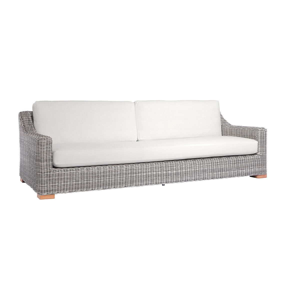 The Tortola Sofa, crafted from hand-woven all-weather wicker. Features grand proportions with extra-deep cushions. By Kingsley Bate. Find a dealer near you.