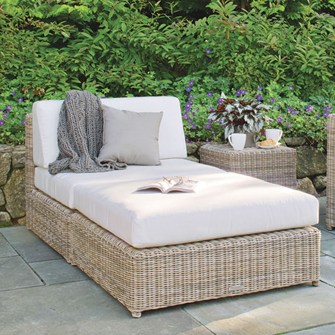 The Sag Harbor Sectional Ottoman brings coastal elegance to outdoor spaces with its hand-woven all-weather wicker and generous 37.5-inch square footprint. Built for durability in direct sun, rain, and salt air. - alternate view