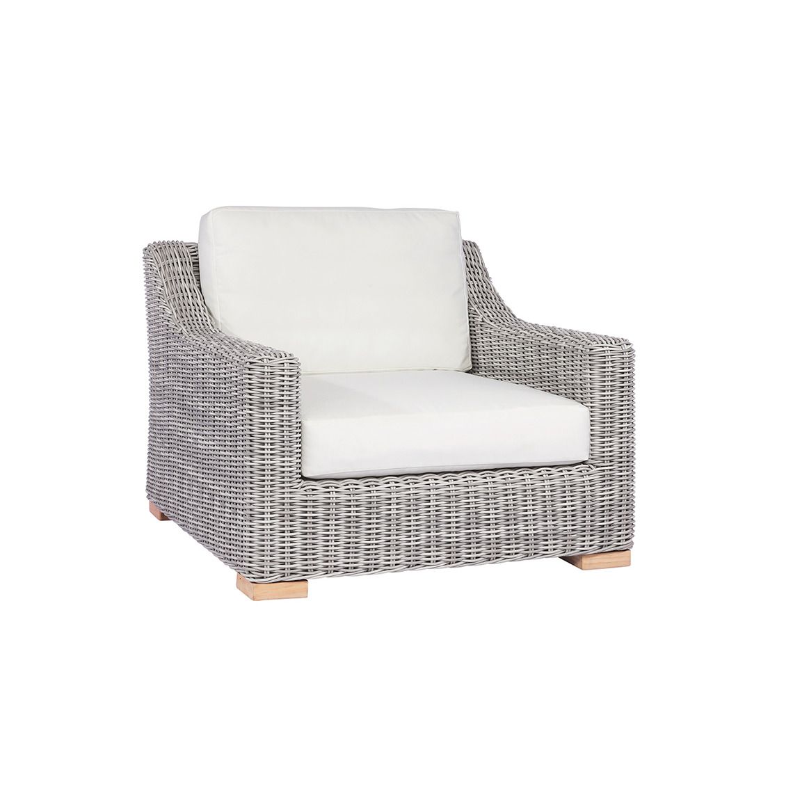 The Tortola Lounge Chair, crafted from hand-woven all-weather wicker. Features grand proportions with extra-deep cushions. Find a dealer near you.