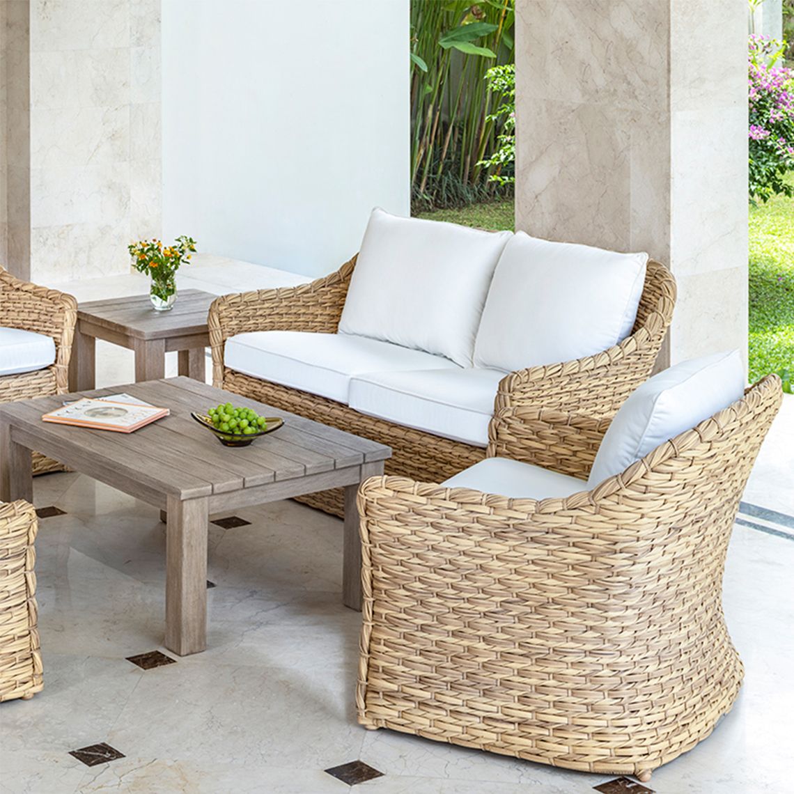 The Vero Settee is a outdoor settee crafted from hand-woven wicker, featuring coastal-inspired gentle curves. By Kingsley Bate. Find a dealer near you. - alternate view