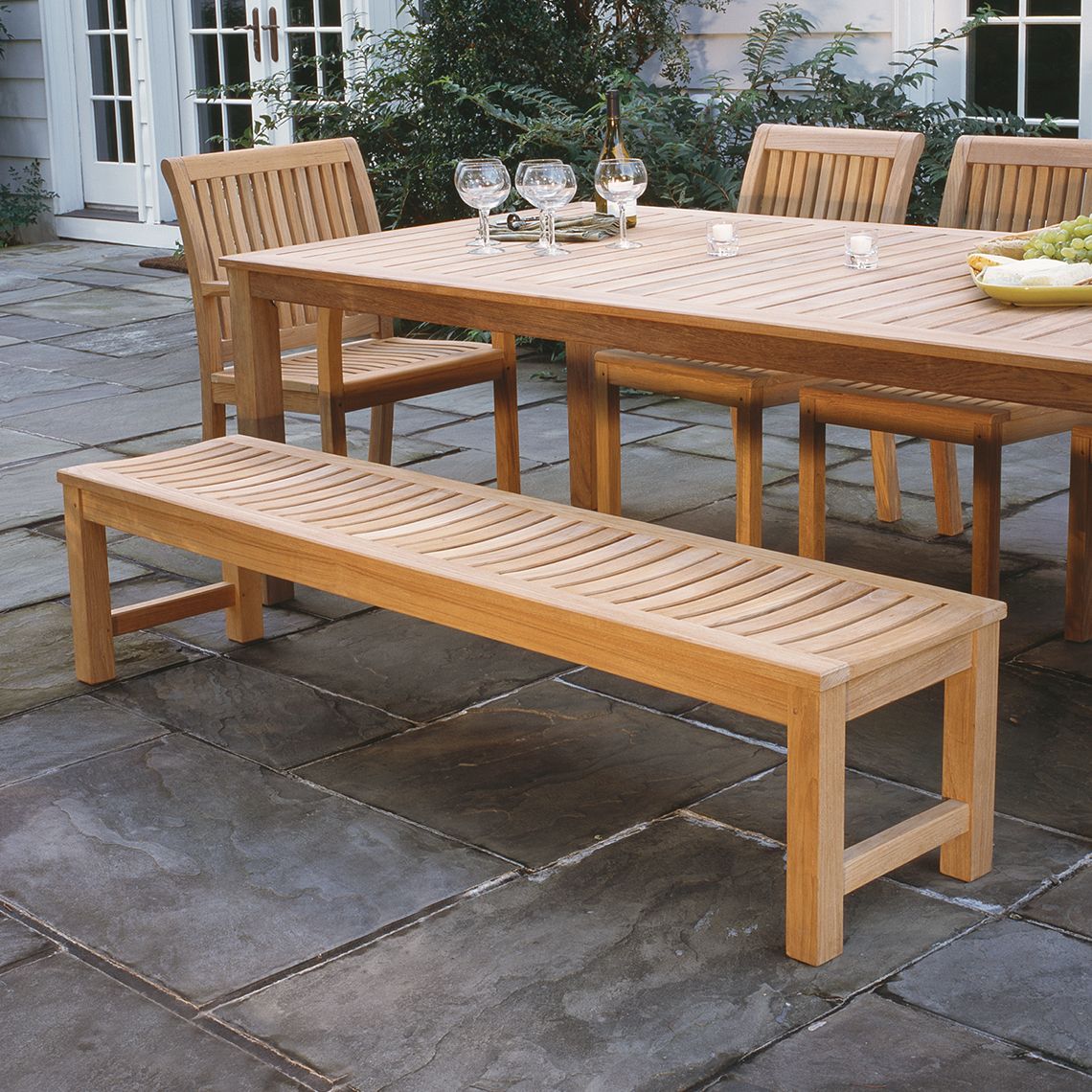 The Waverley 6' Backless Bench crafted from Grade A teak can be paired with a range of dining tables or utilized independently, poolside or on tennis court. - alternate view