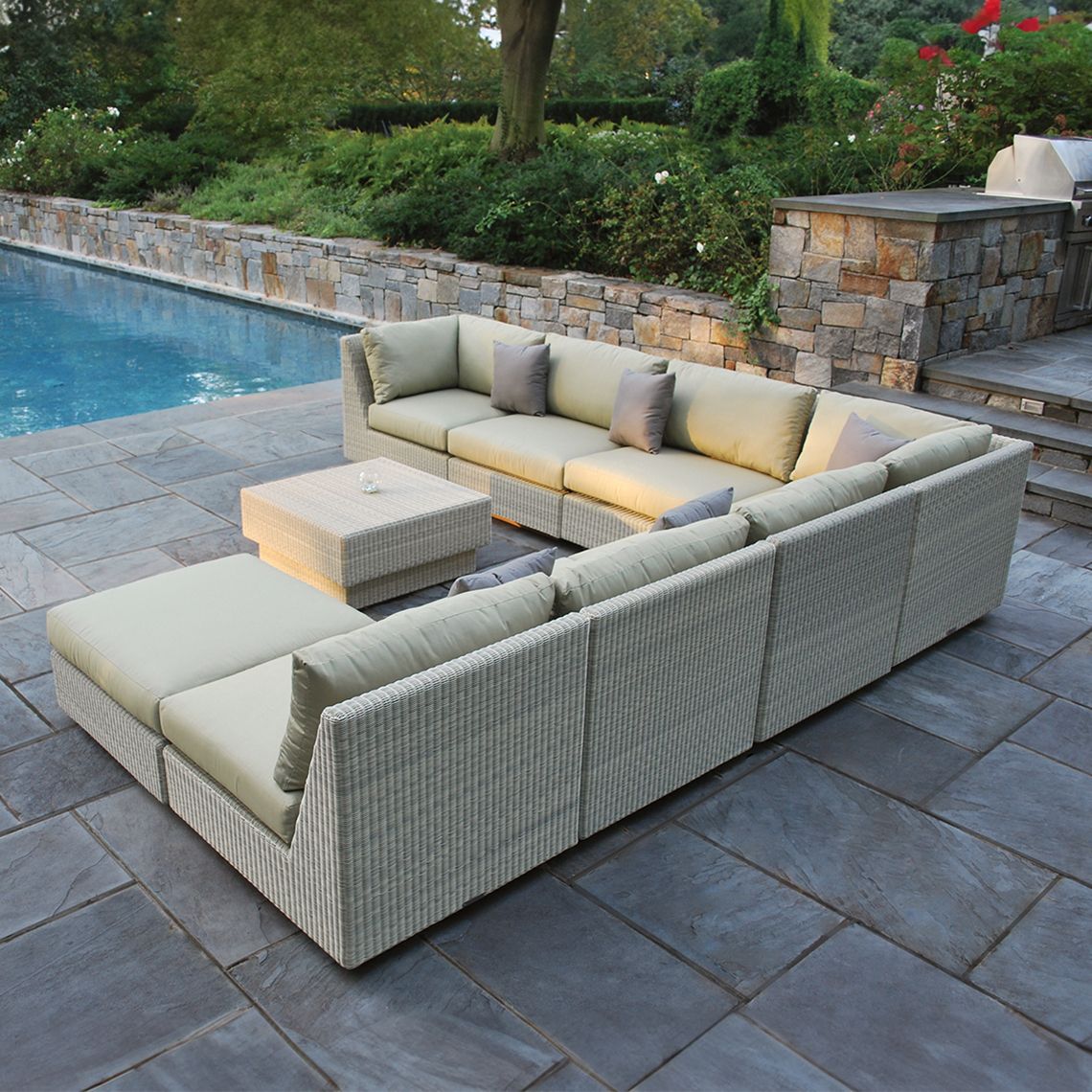The Westport Sectional Ottoman, crafted from hand-woven wicker. Features streamlined simplicity with solid teak bases. By Kingsley Bate. Find a dealer near you. - alternate view