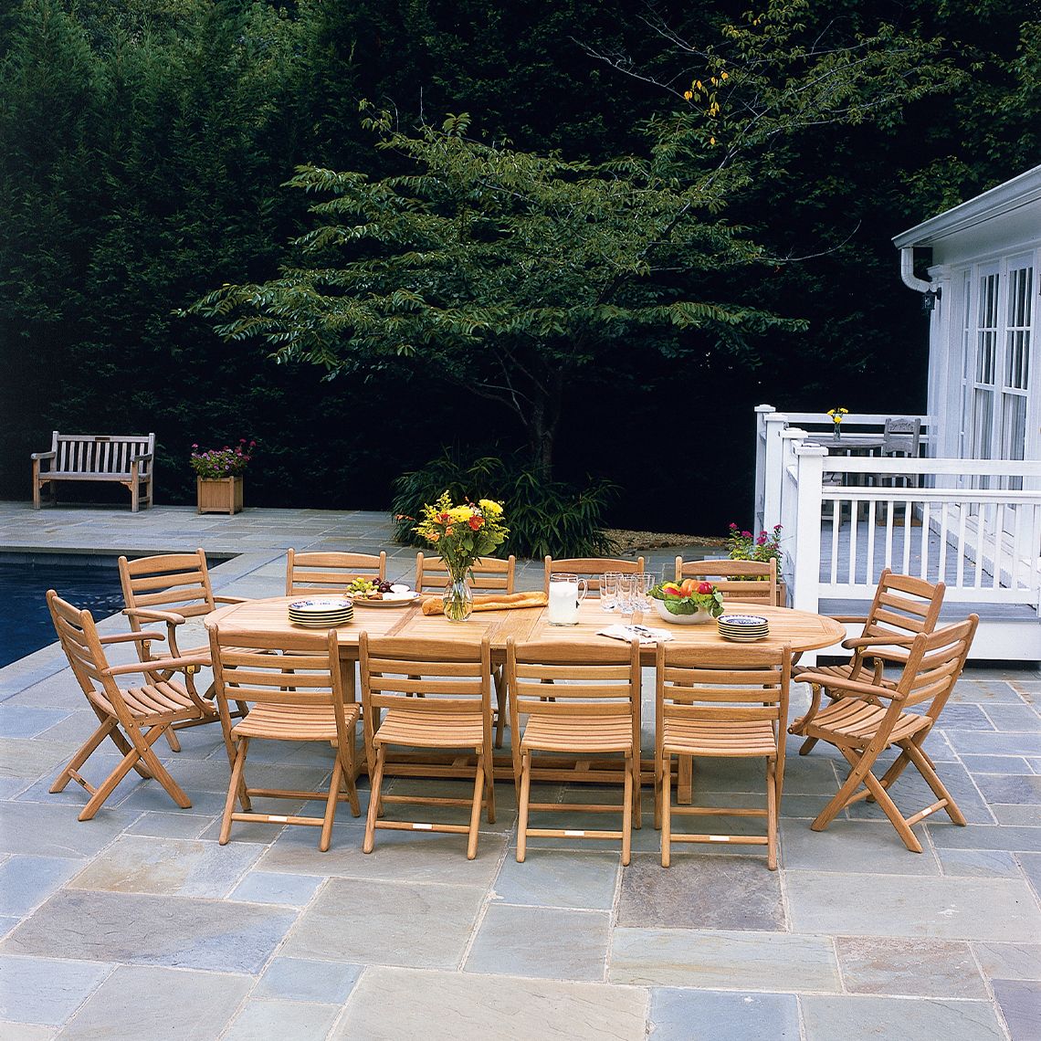 The Essex 114" Oval Extension Table in Grade A teak. Classic English dining and occasional tables. By Kingsley Bate. Find a dealer near you. - alternate view