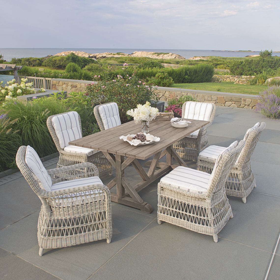 The Provence 73" table brings old-world European charm to outdoor spaces with its distressed teak construction. Built to withstand diverse climates including salt-air, rain, and snow, this farmhouse-style piece seats six. - alternate view