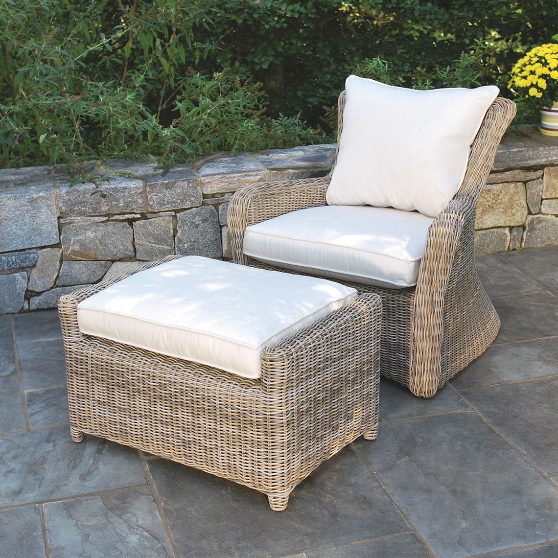 The Sag Harbor Ottoman brings coastal elegance to outdoor spaces with its extra-large hand-woven wicker construction. Weather-resistant and stylish, it's perfect for poolside lounging or patio seating areas. - alternate view