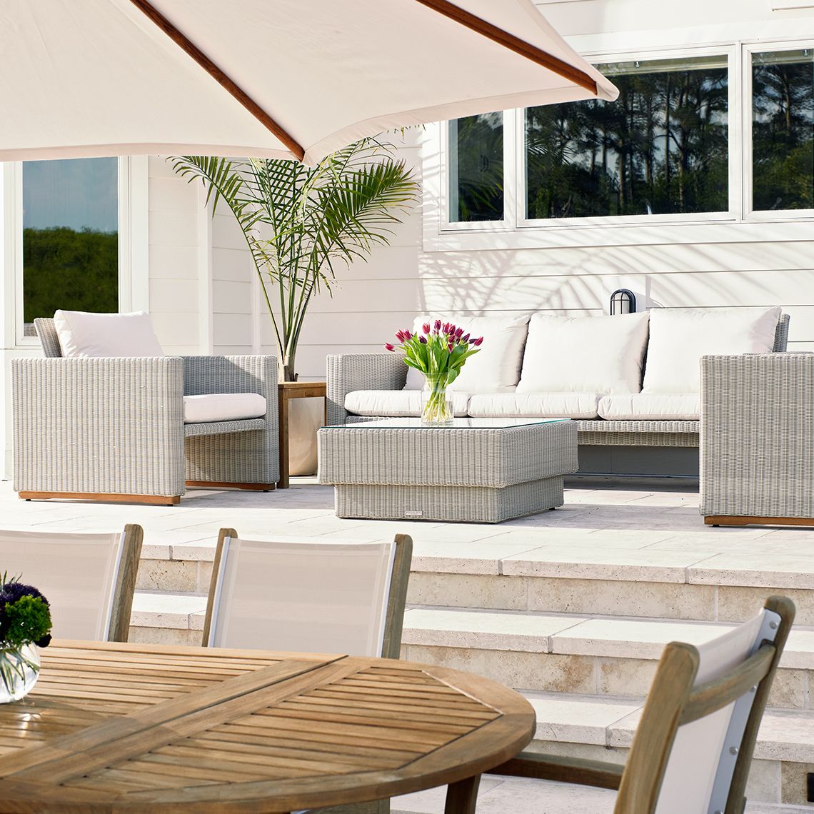 The Westport Sofa, crafted from hand-woven all-weather wicker. Features streamlined simplicity with solid teak bases. By Kingsley Bate. Find a dealer near you. - alternate view